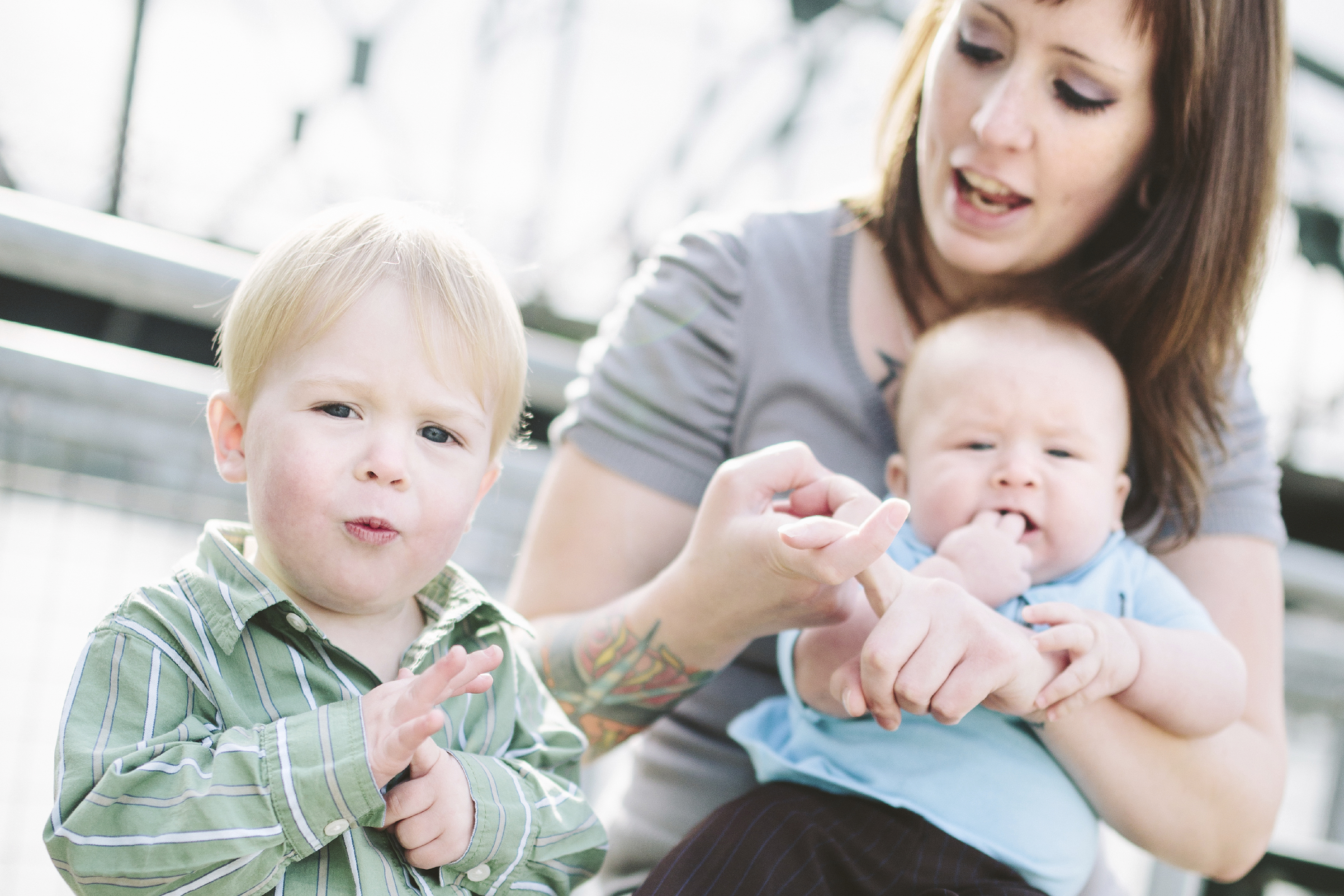A parent using sign language with a young child. (iStock Photo)