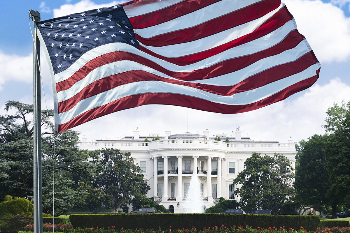 American flag flying in front of the White House. (iStock Photo)