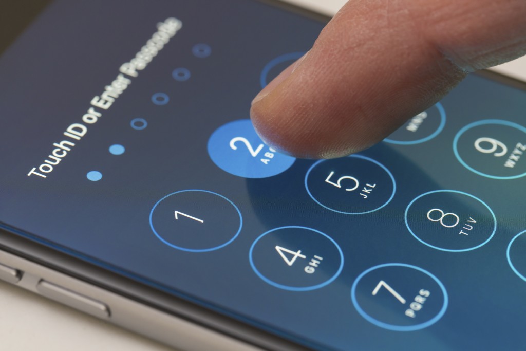 Entering a passcode on an iPhone running iOS9. (iStock Photo)