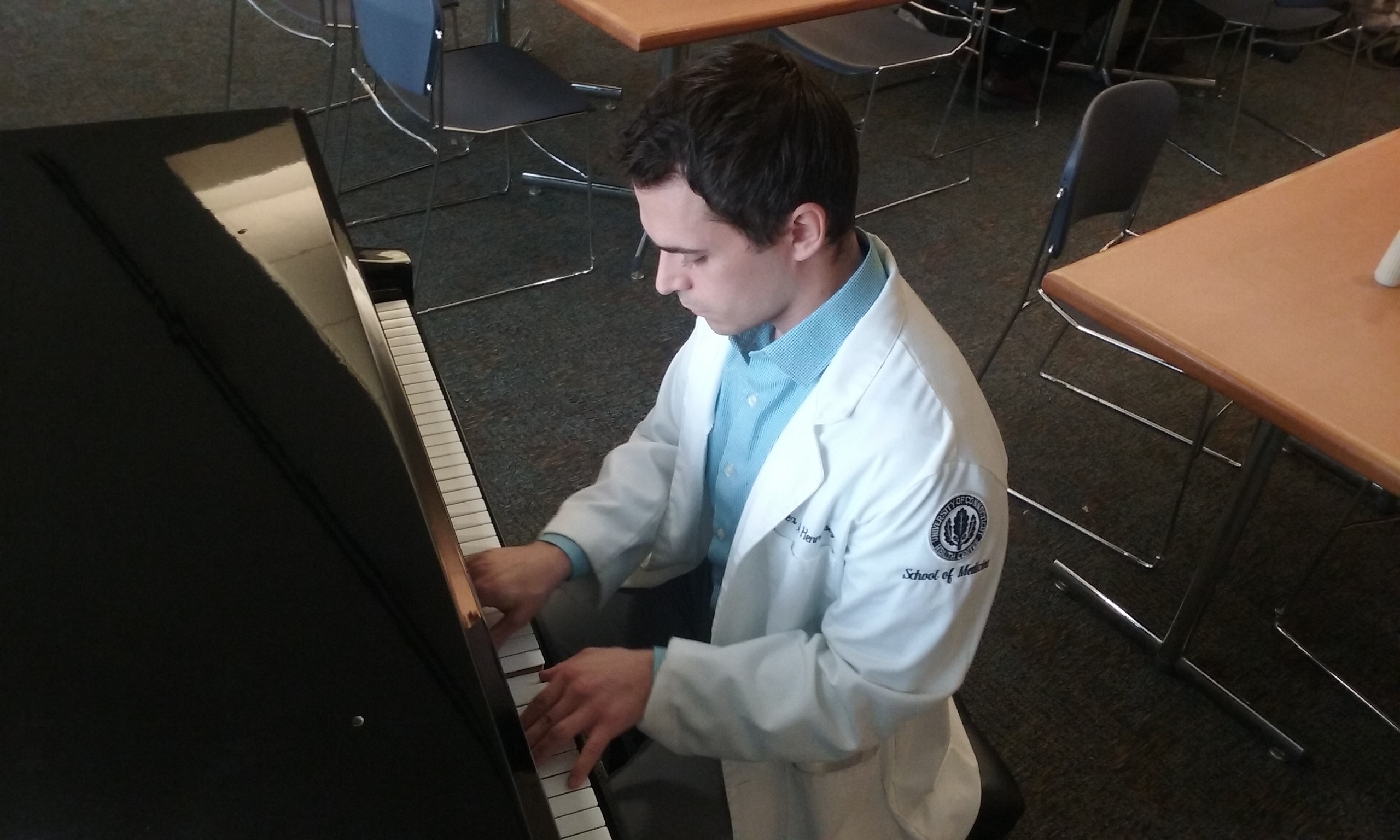 Alex Hennessey is trained in both music and medicine. (Photo by Chris DeFrancesco)
