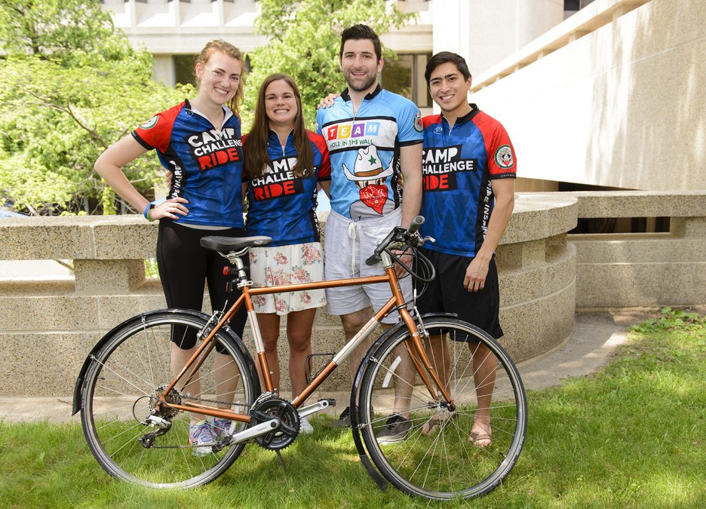 UConn medical students bicycling across country to support The Hole In The Wall Gang Camp. From left, Emily Wilkins, Abbie Doelger, Gerard Kerins and Dan Prior. (Photo by Janine Gelineau)