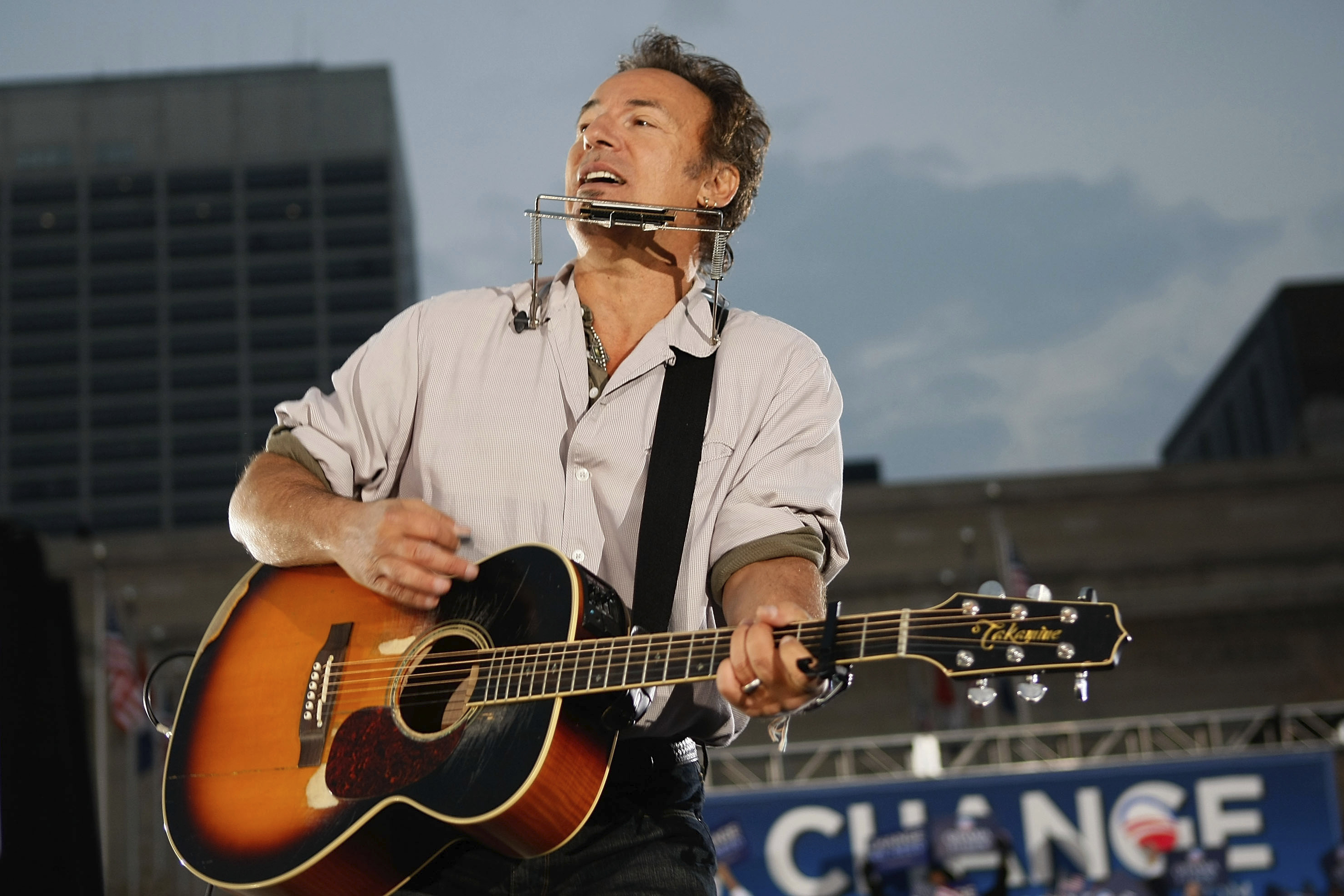 Singer Bruce Springsteen plays before Democratic presidential nominee U.S. Sen. Barack Obama (D-IL) takes the stage during a campaign rally at the Cleveland Mall November 2, 2008 in Cleveland, Ohio. Obama continues to campaign as Election Day begins to draw near as he runs against his Republican challenger, Sen. John McCain. (Photo by Joe Raedle/Getty Images)