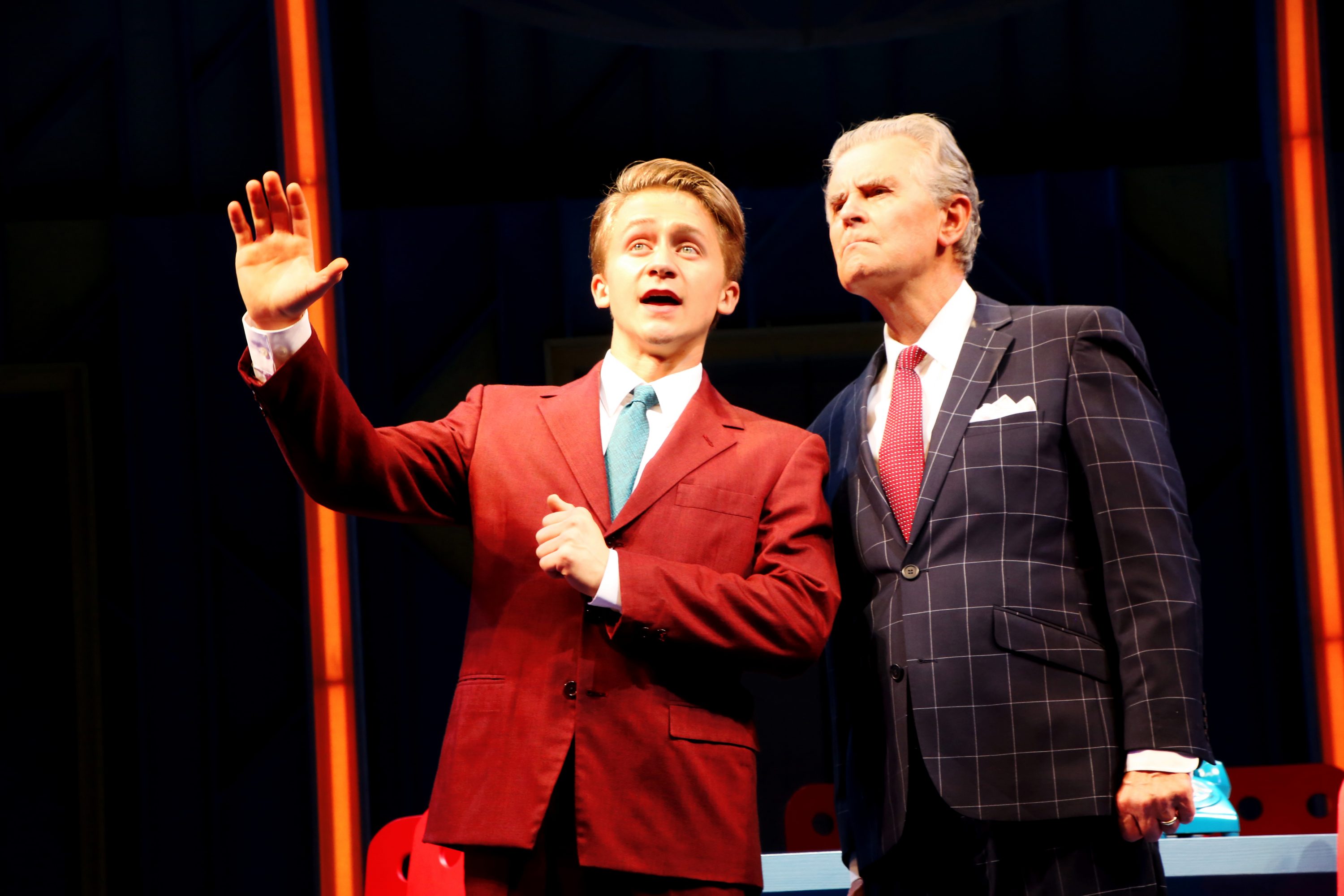 Riley Costello (Finch), left, and Fred Grandy (Biggley) in 'How to Succeed in Business Without Really Trying,' onstage June 2-12, 2016 at Connecticut Repertory Theatre’s Harriet S. Jorgensen Theatre. (Gerry Goodstein for UConn)