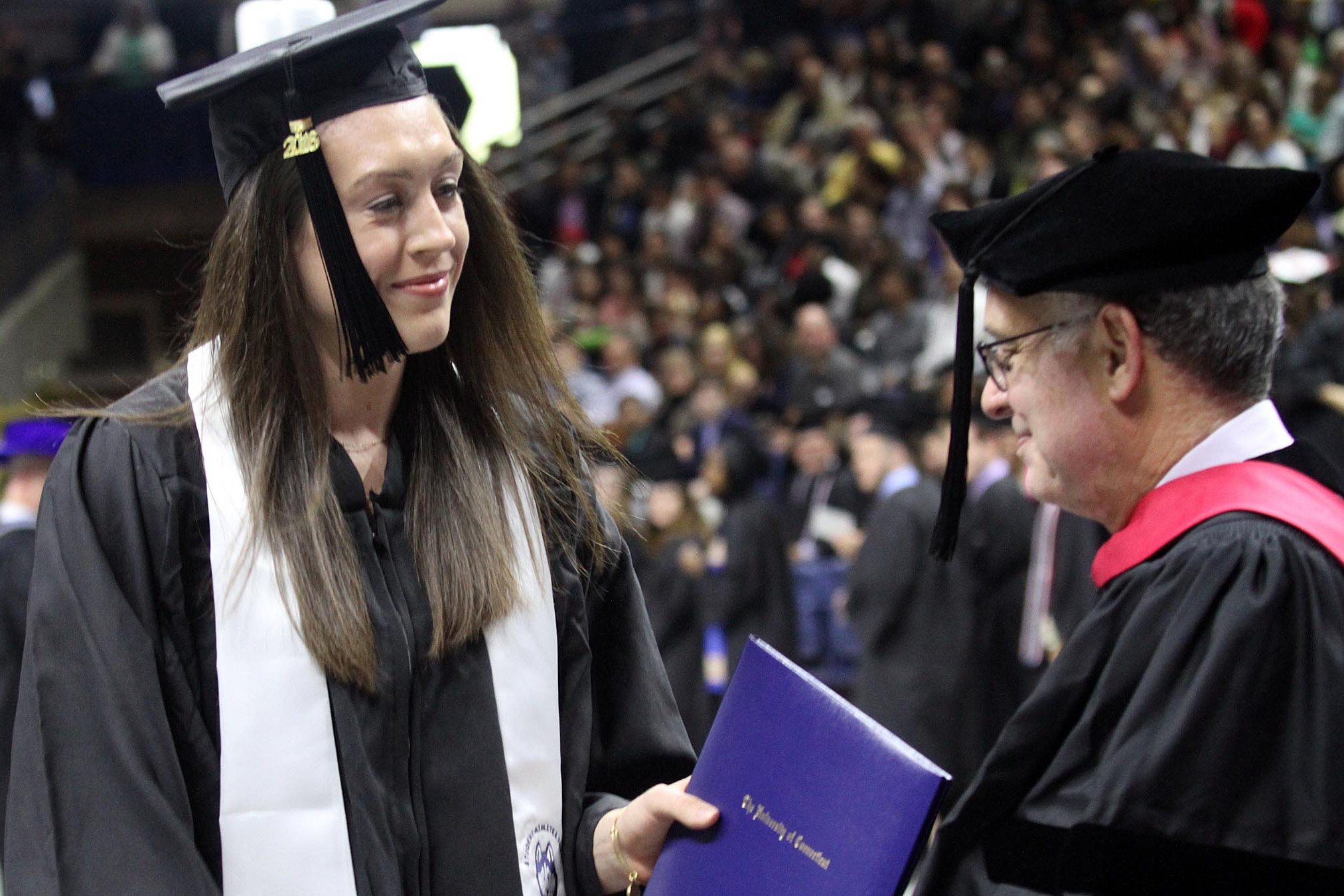 Breanna Stewart '16 (CLAS) receives her diploma during Commencement this past May. (Bob Stowell for UConn)