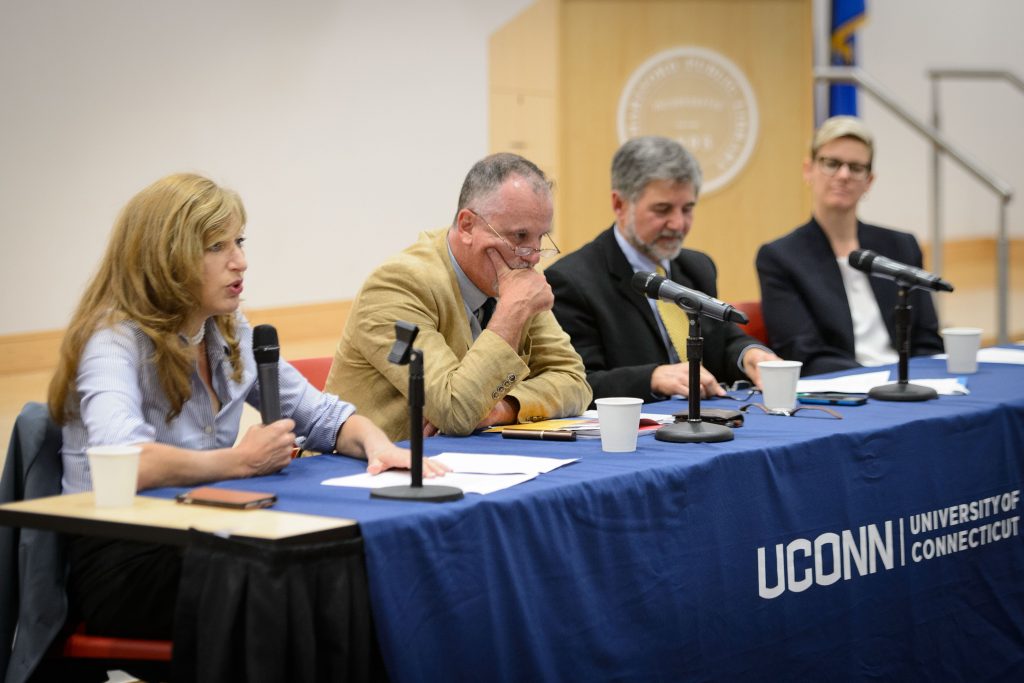 An interdisciplinary panel of UConn experts offered perspectives on the upcoming Presidential election during a public event moderated by President Herbst at the Hartford Public Library on Sept. 22. (Peter Morenus/UConn Photo)