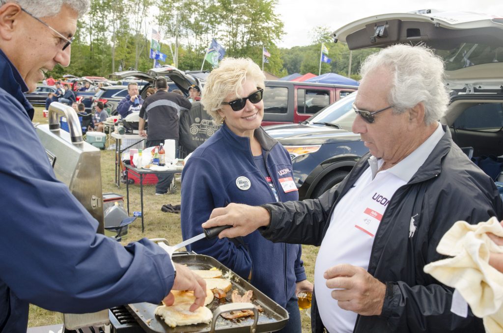 Nick Zecchino operated the grill for friends and family at Saturdays tailgate for the Syracuse game. Sept. 24, 2016. (Garrett Spahn '18 (CLAS)/UConn Photo)