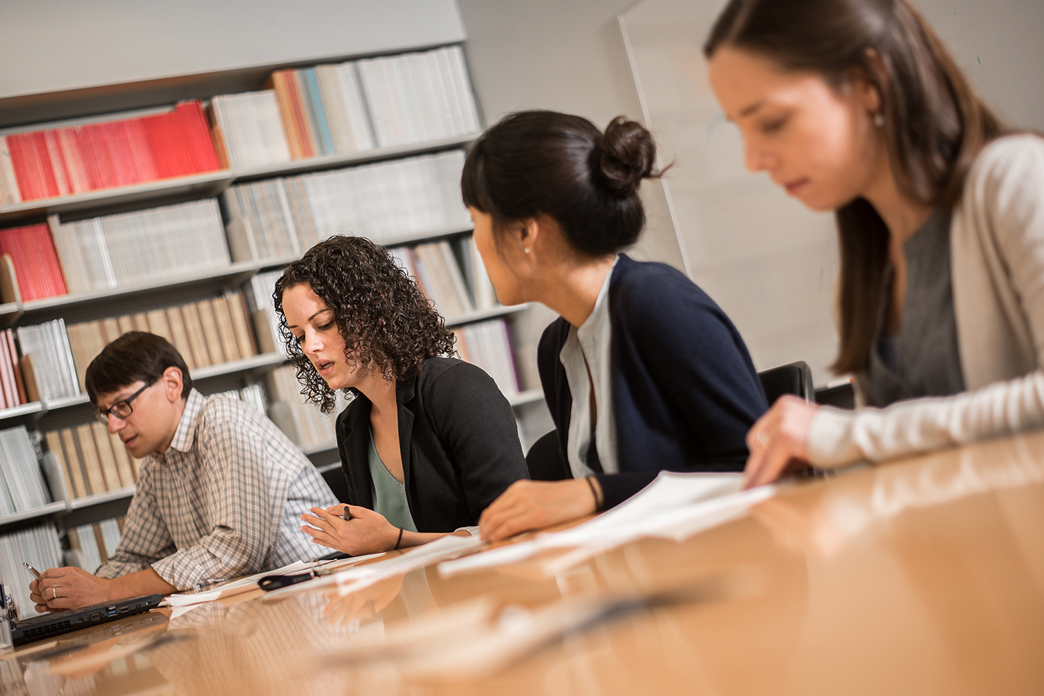 Current accounting students working with Associate Professor Todd Kravet (Nathan Oldham/UConn photo)