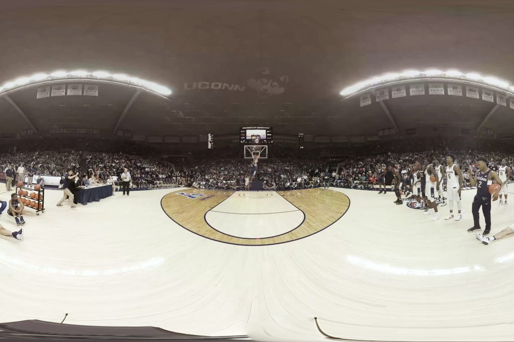 A 360° camera captures the action from the floor during the First Night dunk contest in Gampel Pavilion. (Bret Eckhardt/UConn Photo)