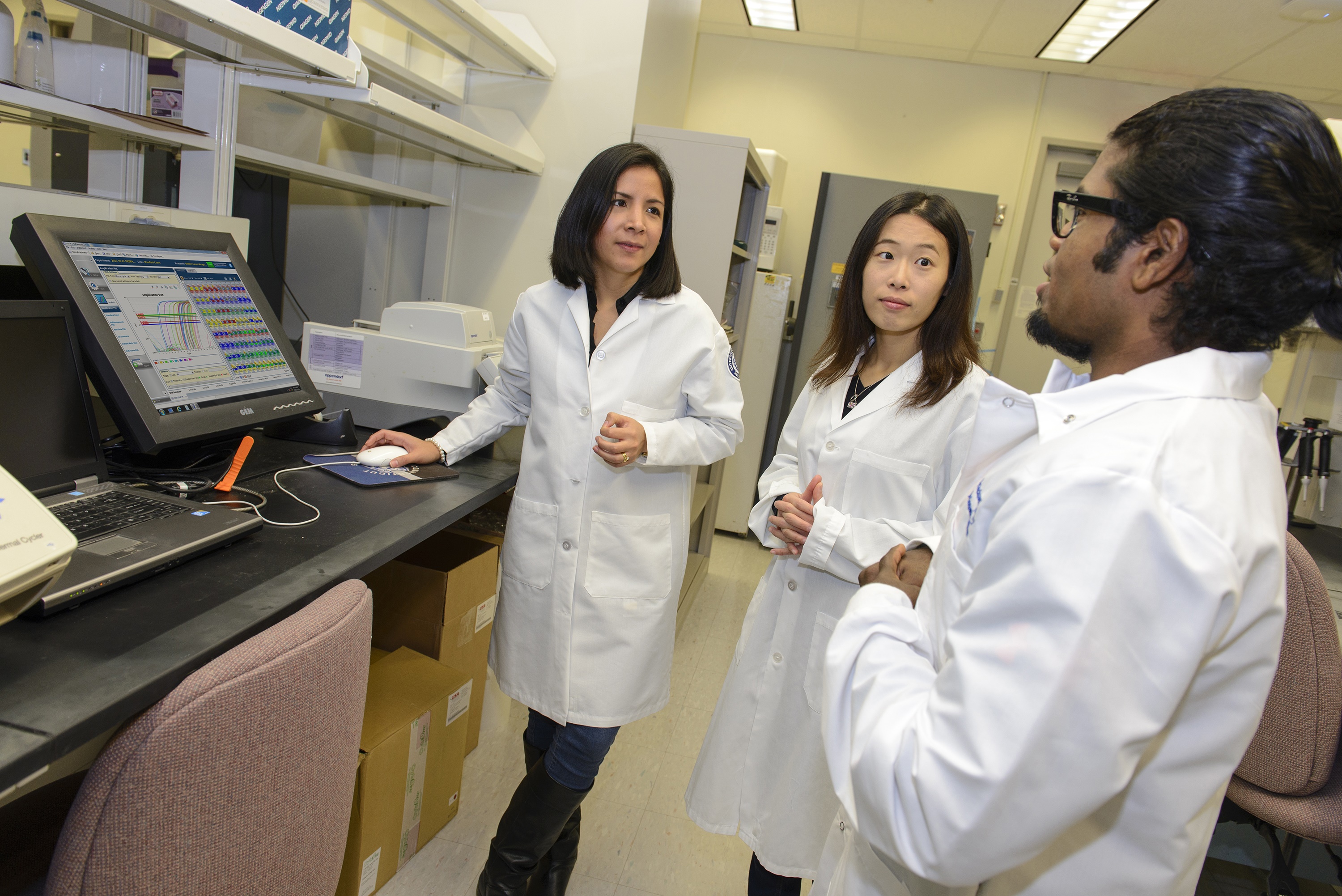 Denisse Tafur, Huakang Huang and Dinesh Babu Uthaya Kumar are UConn Graduate School students studying biomedical science who completed advanced training in translational research at the NIH's Clinical Center this summer.