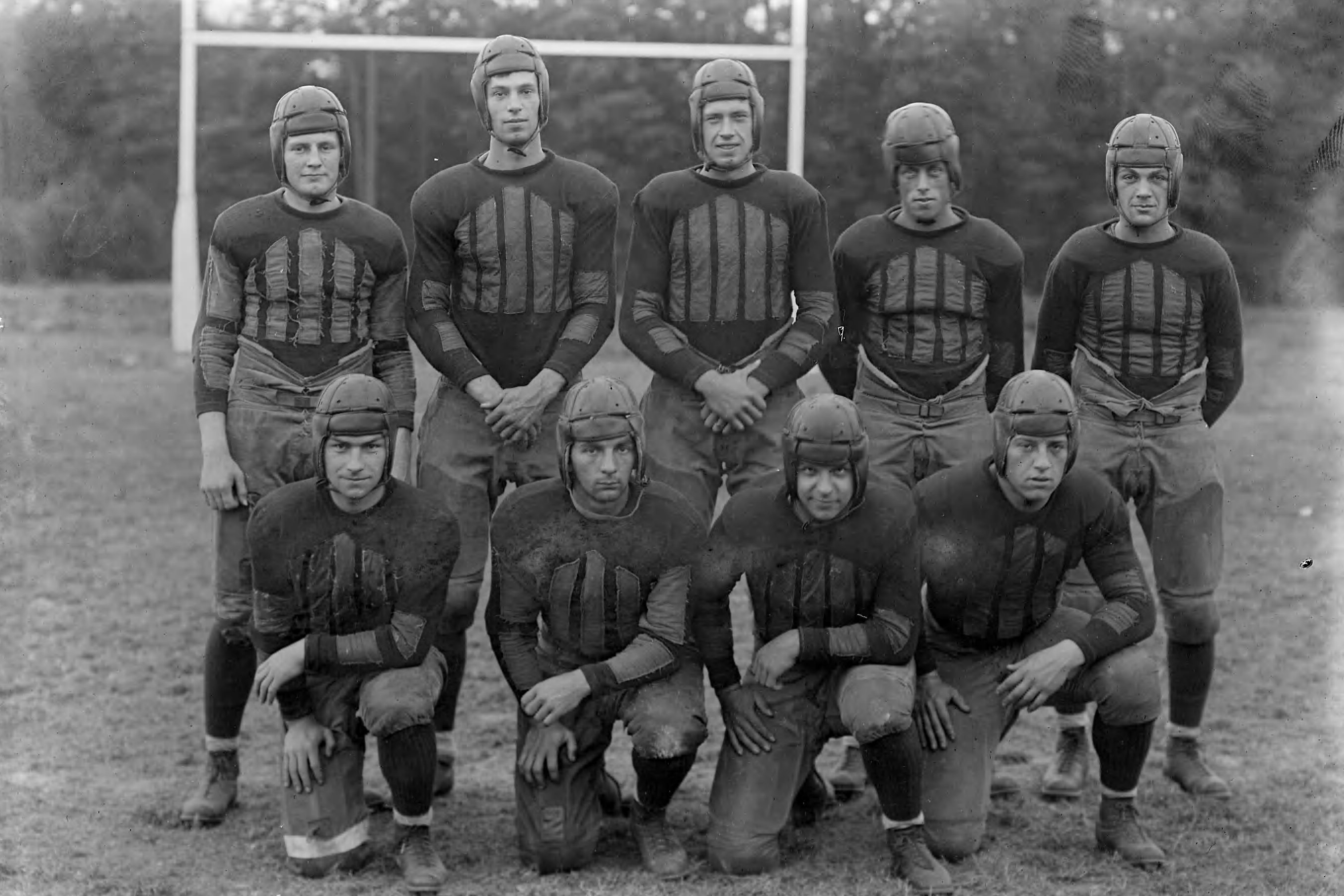 Nine players from the Connecticut Agricultural College football team, known as the 'Aggies,' in 1927.