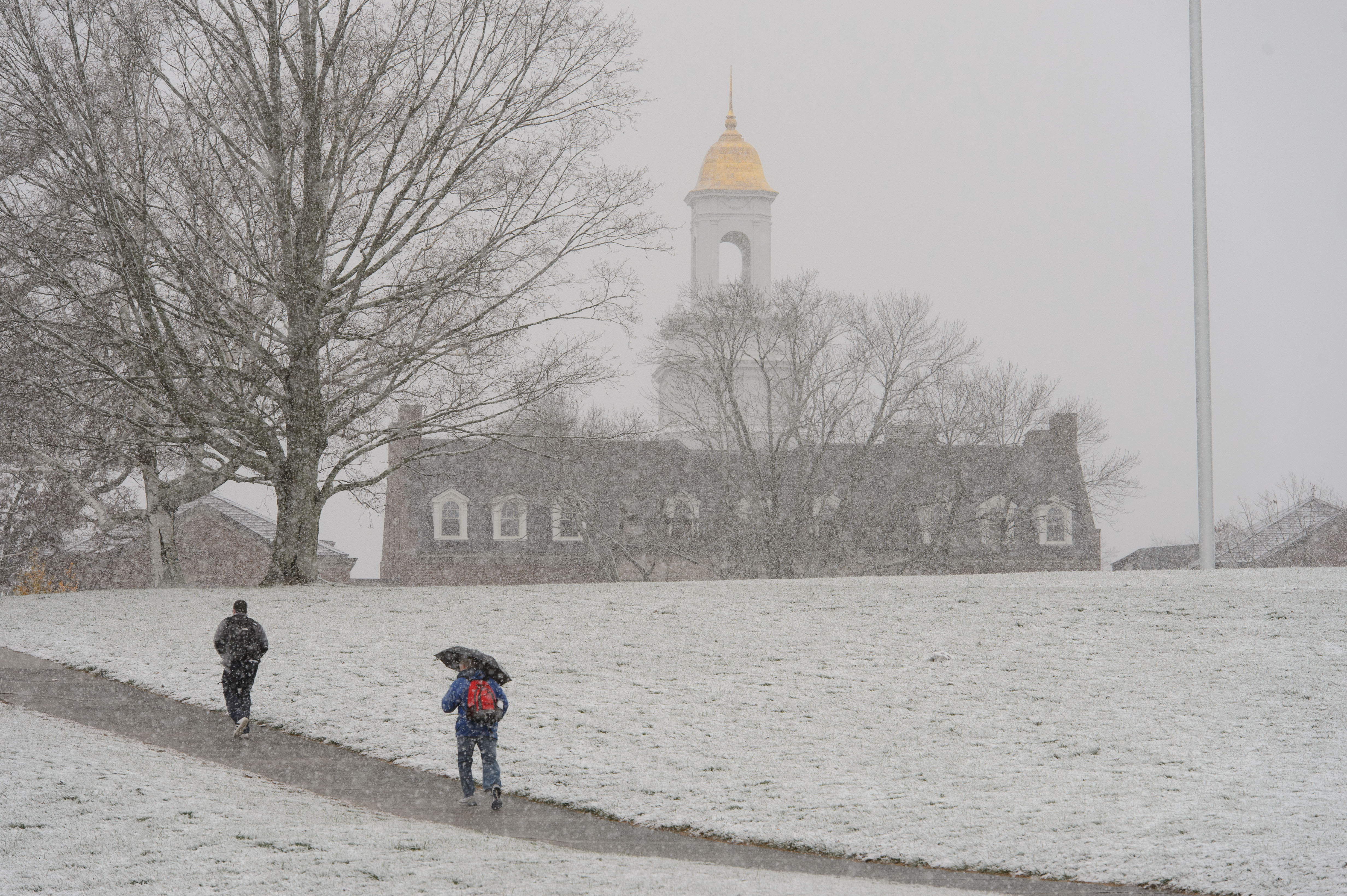 A snowy view of the Great Lawn toward looking toward the Wilbur Cross Building. (Peter Morenus/UConn File Photo)