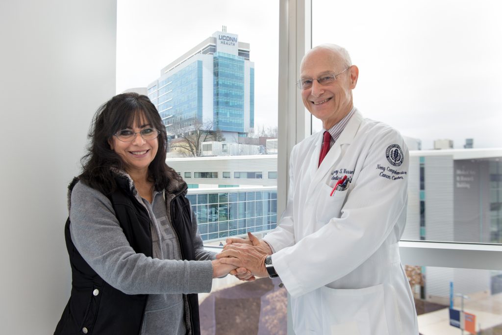 Ovarian cancer patient Marcia Goglia, left, and Dr. Jeffrey Wasser. (Janine Gelineau/UConn Health Photo)