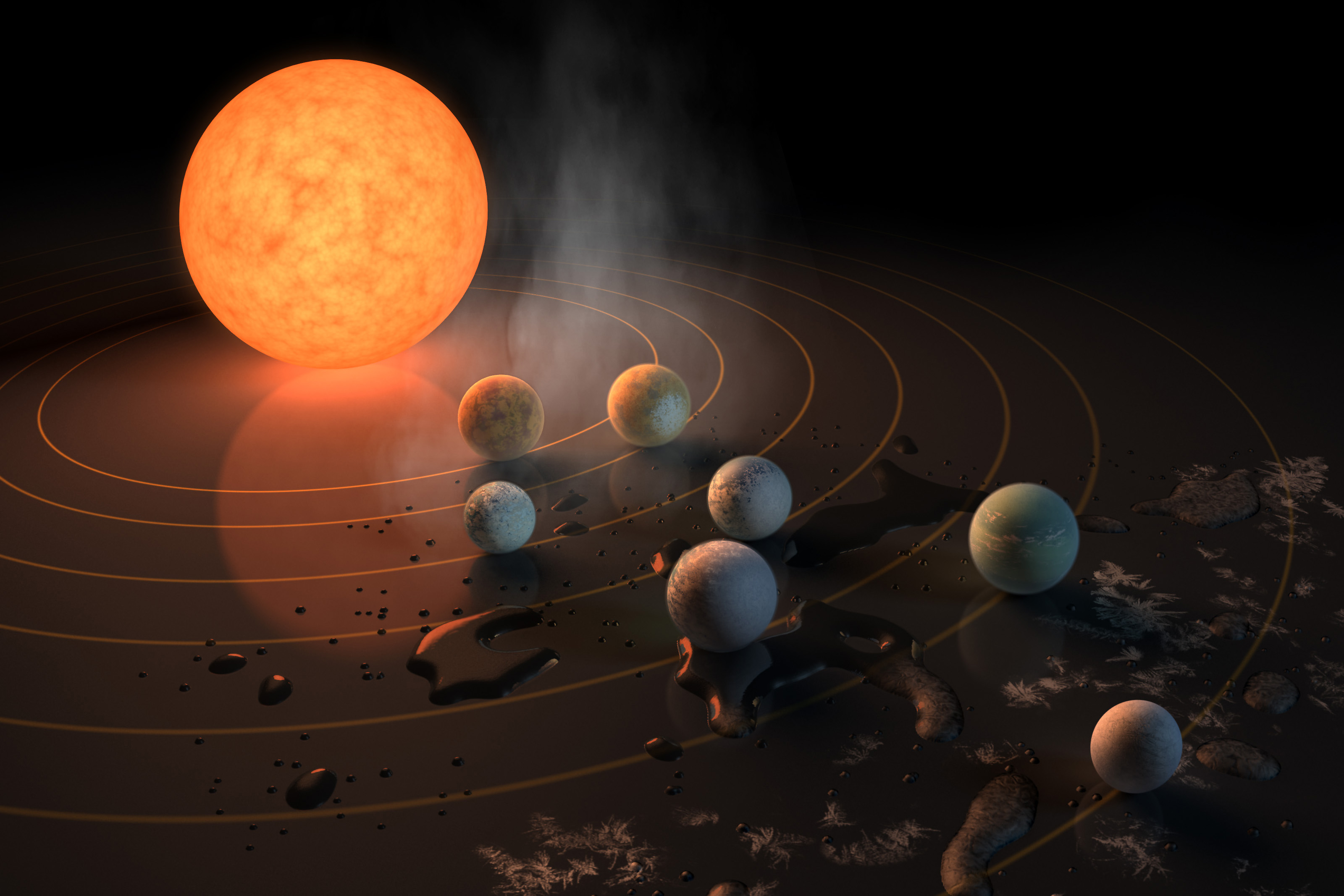 This artist's concept appeared on the Feb. 23, 2017 cover of the journal Nature announcing that the TRAPPIST-1 star, an ultra-cool dwarf, has seven Earth-size planets orbiting it. (NASA Image)