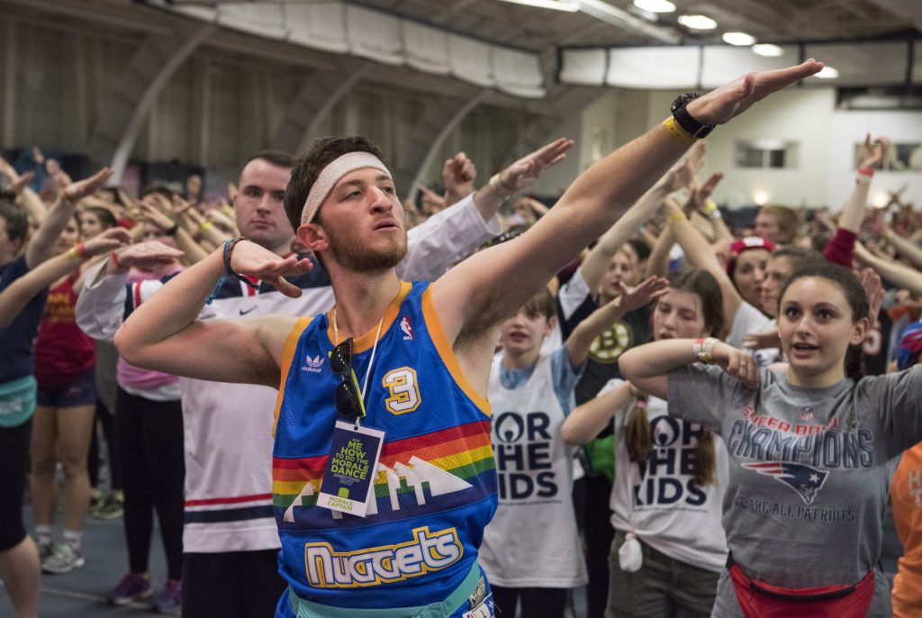 Nearly 2,000 students took part in the HuskyTHON dance marathon at the Greer Fieldhouse on Feb. 18, raising $836,174 for Connecticut Children's Medical Center. (Ryan Glista/UConn Photo)
