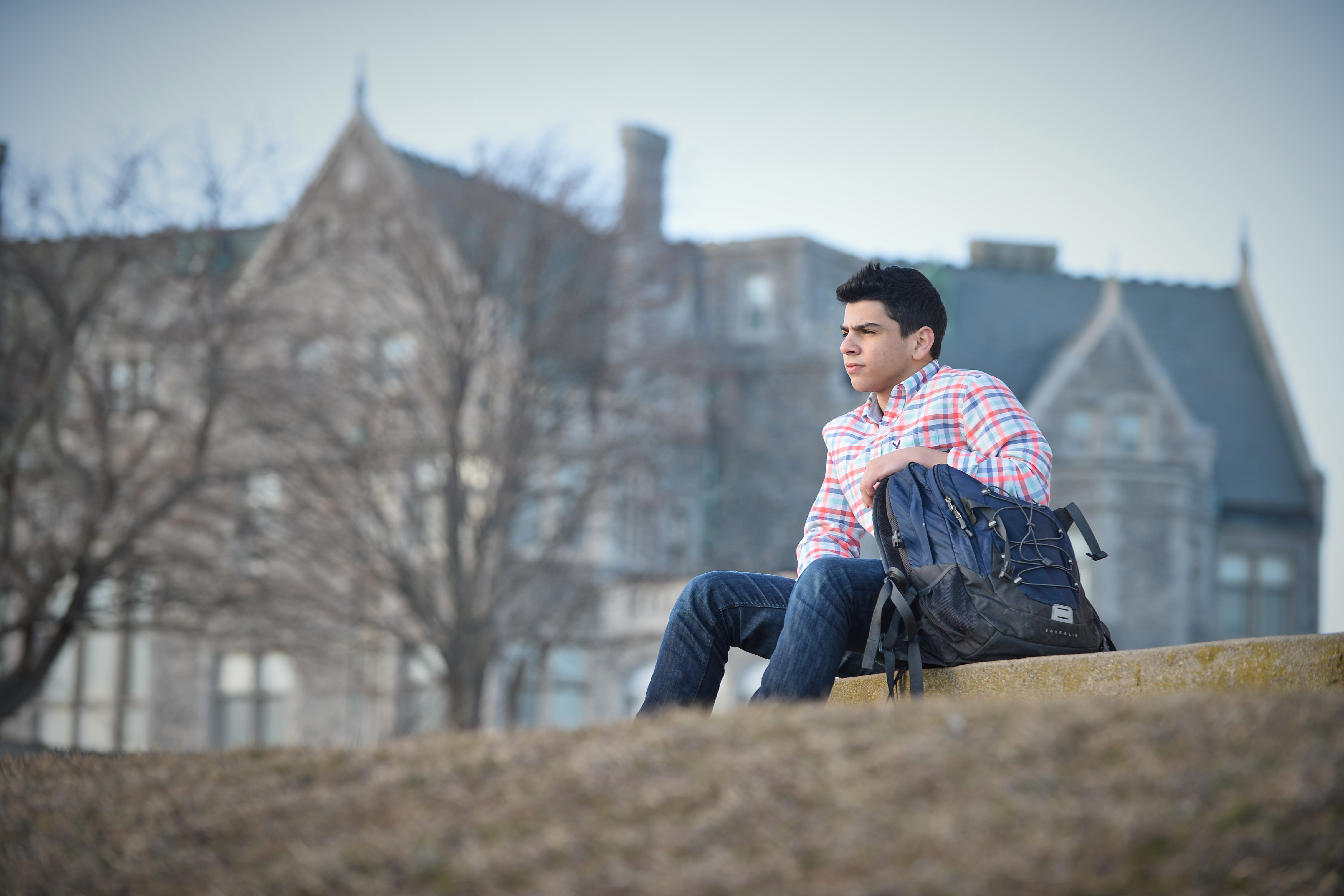 Mohammad Mansour, the youngest of six siblings to pursue undergraduate studies at the Avery Point campus, likes to end each day watching the sun set across Long Island Sound. (Peter Morenus/UConn Photo)
