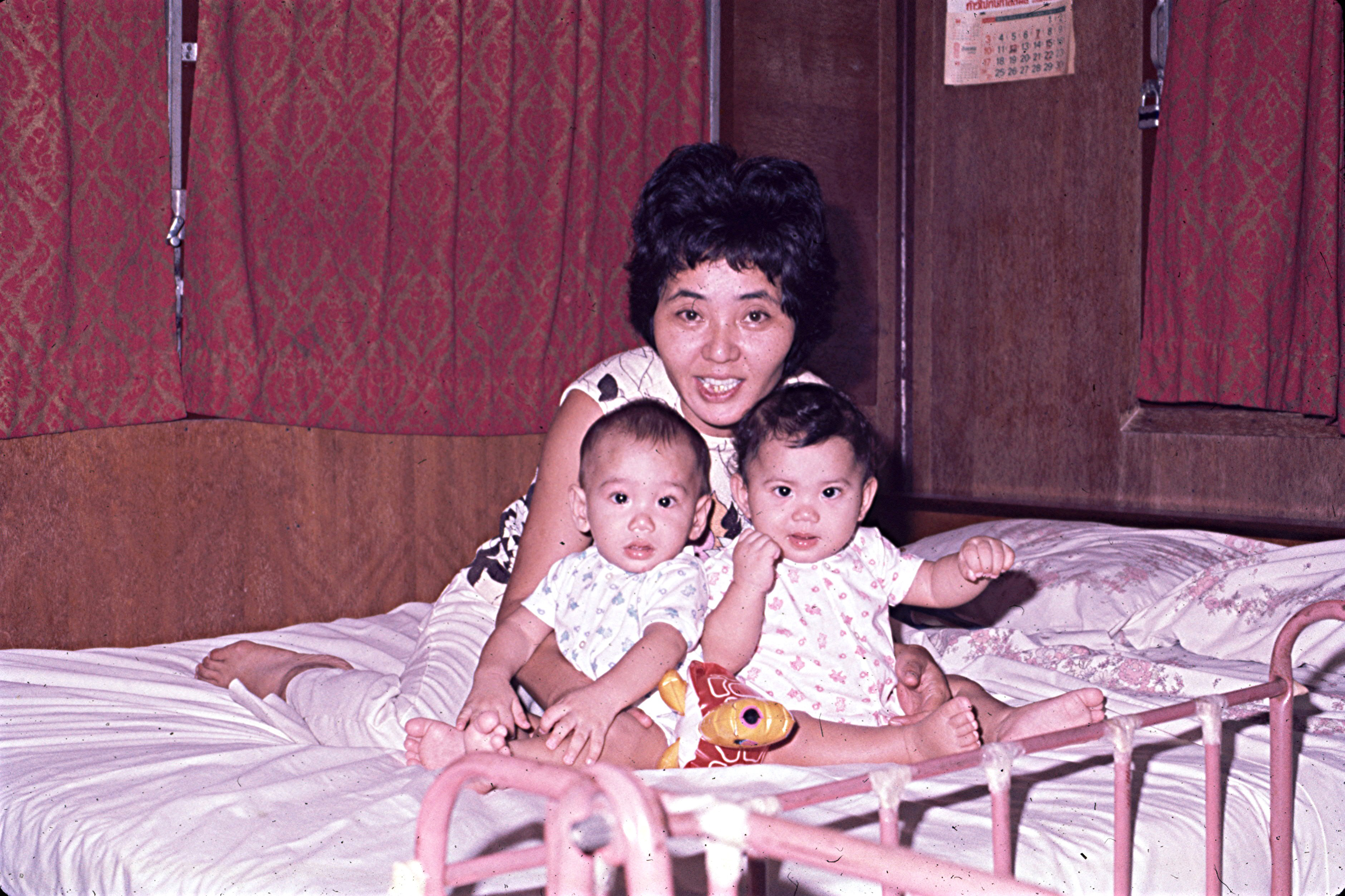 Cathy Schlund-Vials as a baby, right, with her twin brother and mother. (Courtesy of Cathy Schlund-Vials)