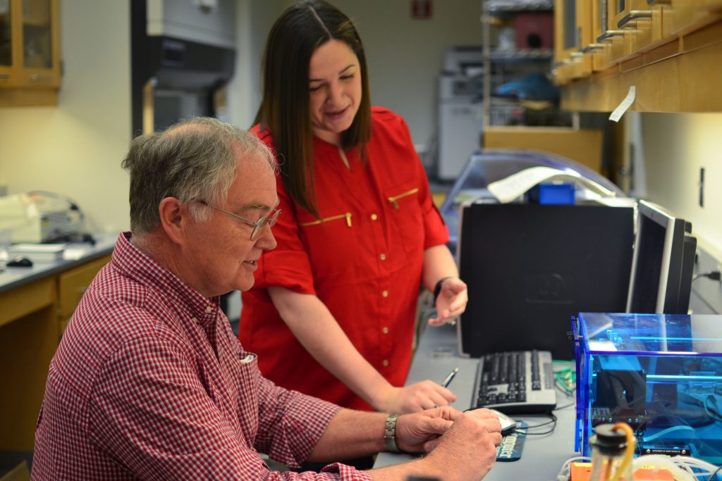 Molecular and cell biology professor Michael Lynes with lab manager Clare Melchiorre. (Taylor Hudak '18 (CLAS, ED)/UConn Photo)