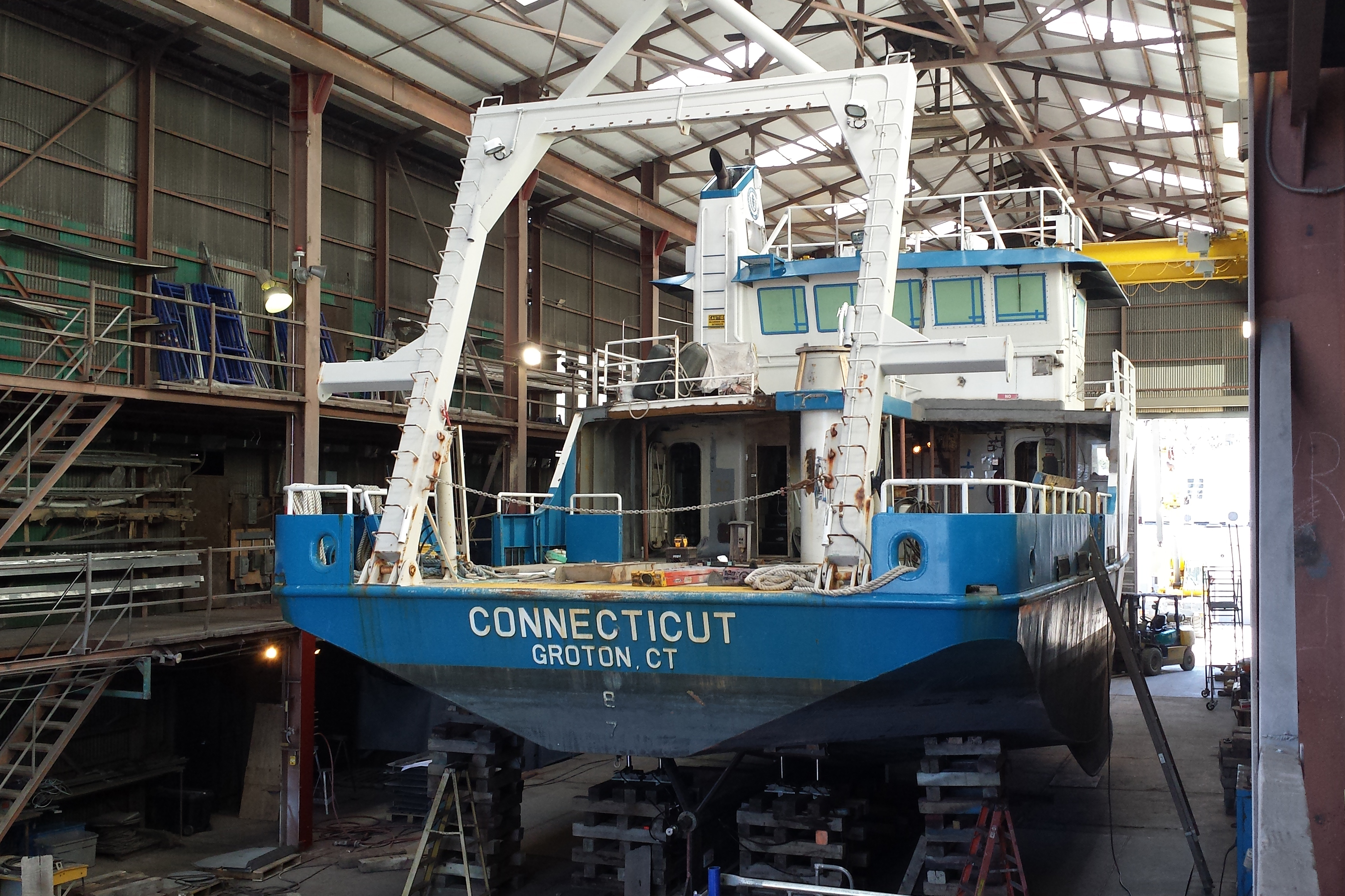 The R/V Connecticut inside the building where it will be split and lengthened at Blount Boats. (UConn Marine Sciences Photo)