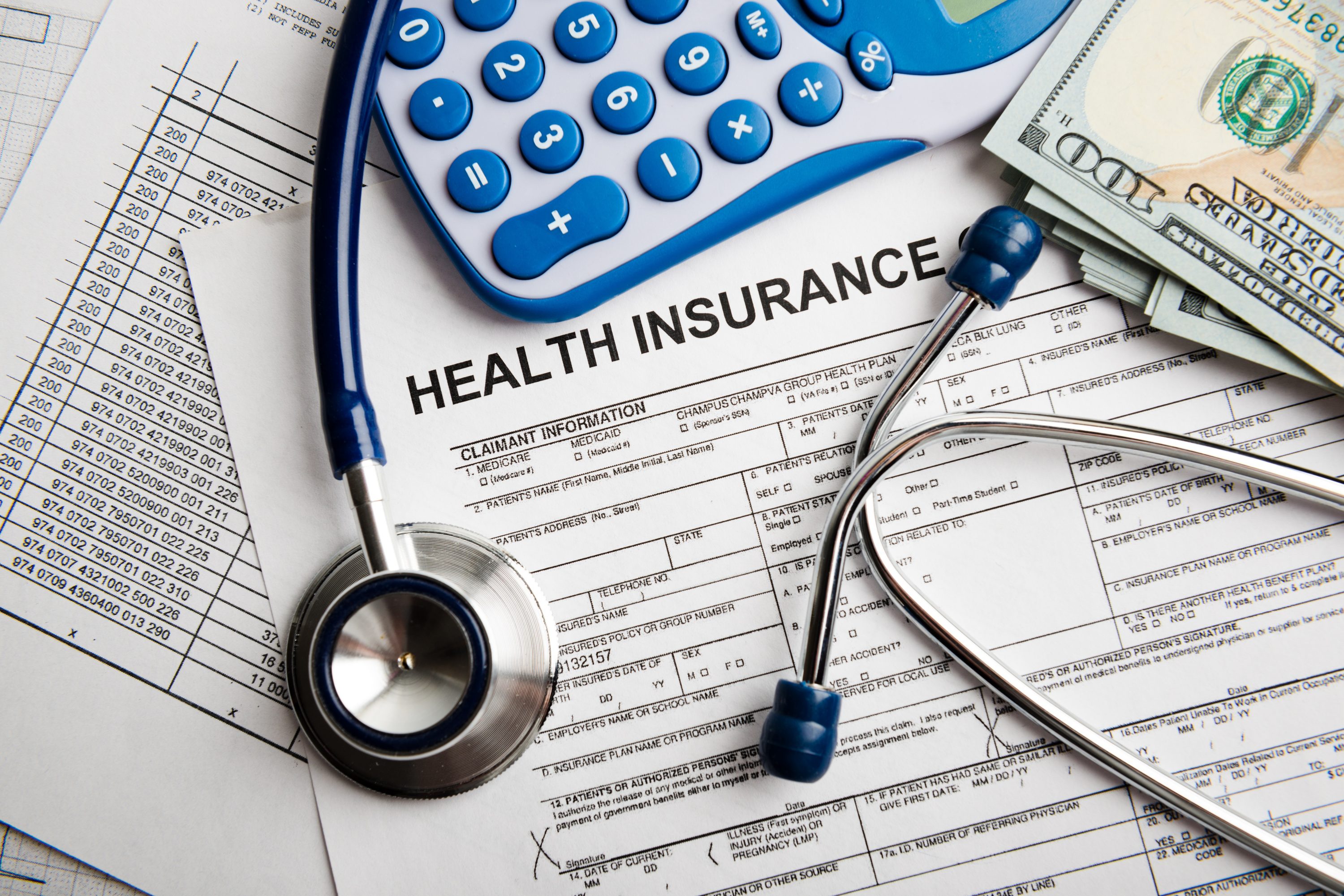Health insurance paperwork. (Shutterstock Photo)