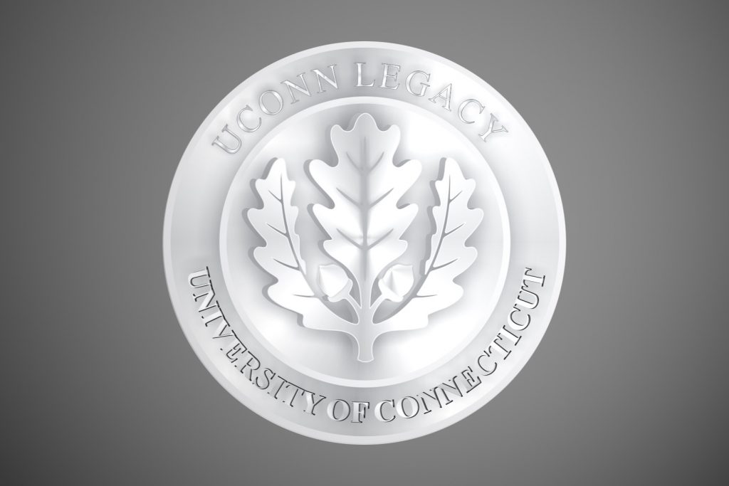 This year, for the first time, the UConn Office of Alumni Relations will distribute legacy medals to graduating seniors who have a parent, grandparent, or sibling who graduated from UConn.