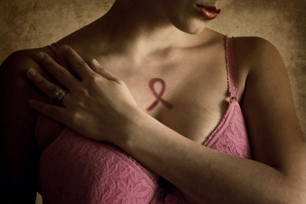Woman in pink bra representing breast cancer awareness month. (Annette Bunch/Getty Images)