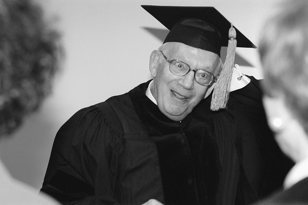 Dr. Raymond Sackler preparing for the 1998 commencement ceremony, where he received an honorary degree. (Richard Boynton/UConn File Photo)