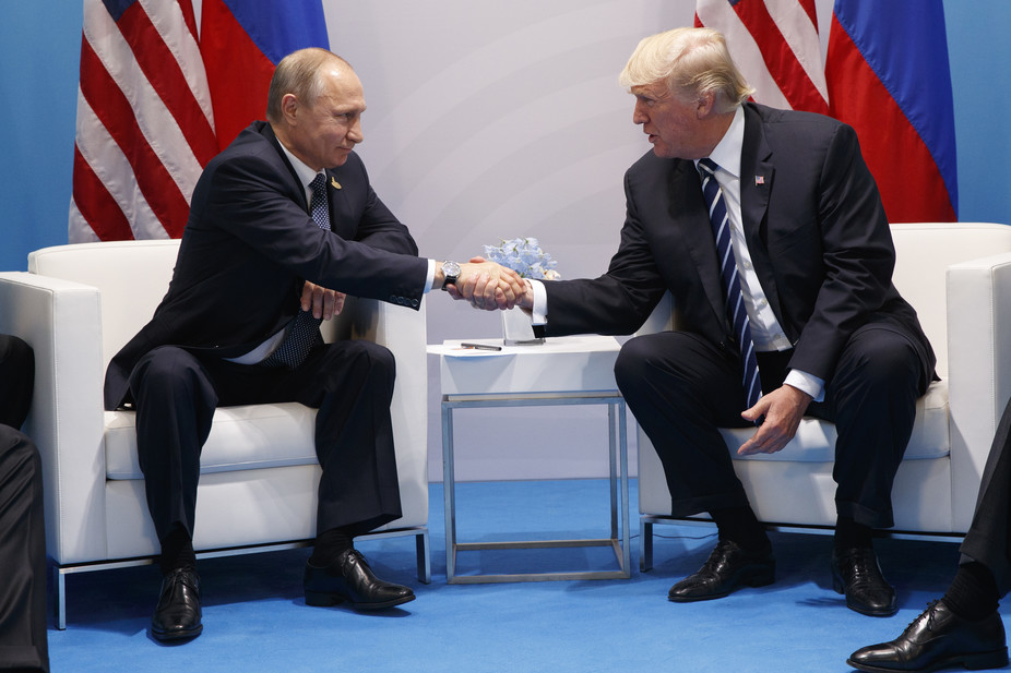 President Donald Trump shakes hands with Russian President Vladimir Putin at the G-20 Summit (AP Photo/Evan Vucci via The Conversation)
