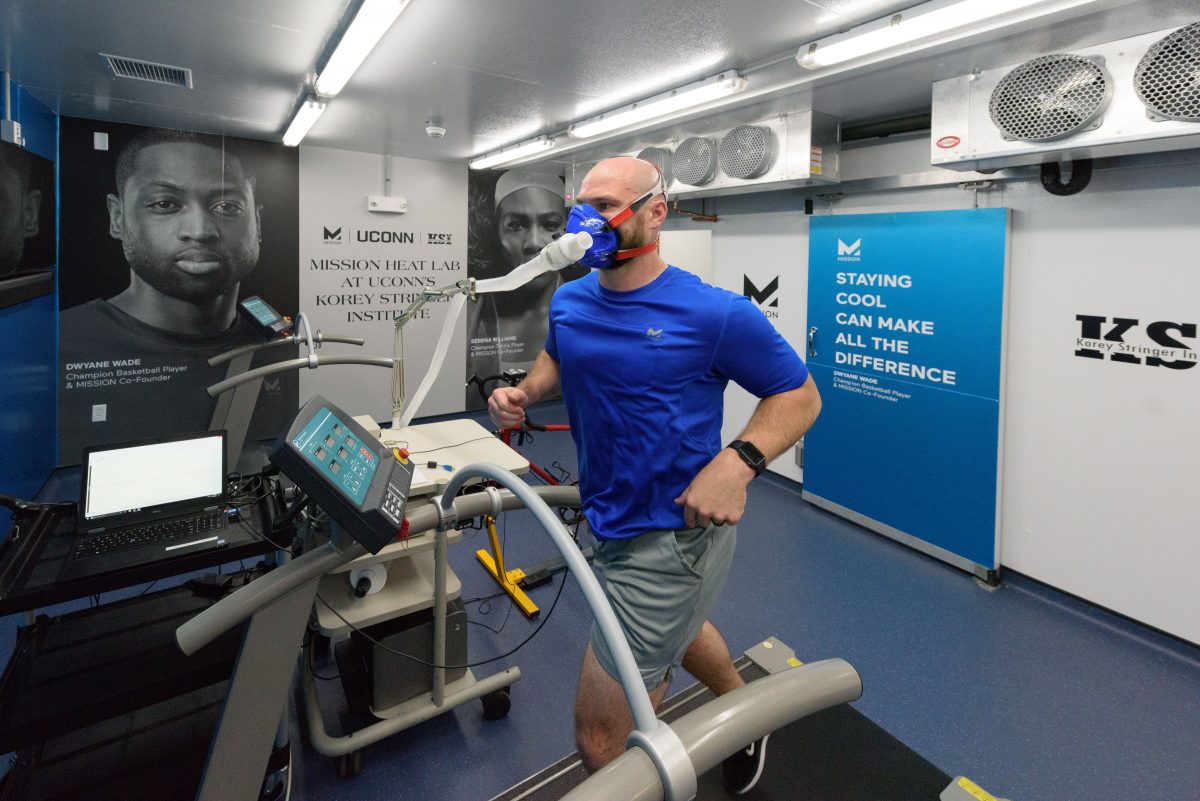 Ryan Curtis, KSI associate director of athlete performance and safety, runs on a treadmill at the Mission Heat Lab at the Korey Stringer Institute at Gampel Pavilion on Sept. 21, 2017. (Peter Morenus/UConn Photo)