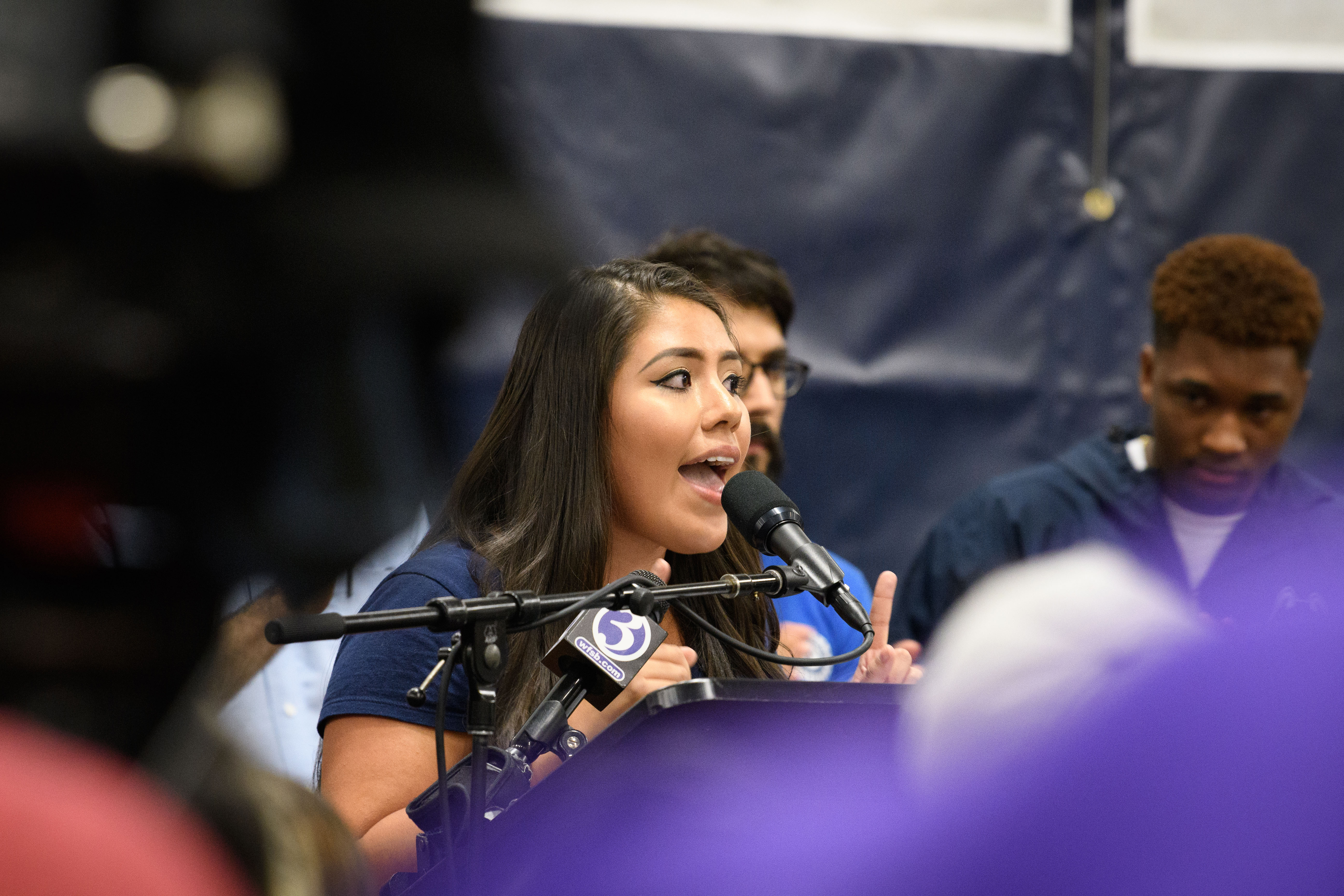 Undergraduate Student Government President Irma Valverde '18 (BUS)(CLAS) speaks during a rally at the Hugh S. Greer Field House on Sept. 20, 2017. (Peter Morenus/UConn Photo)