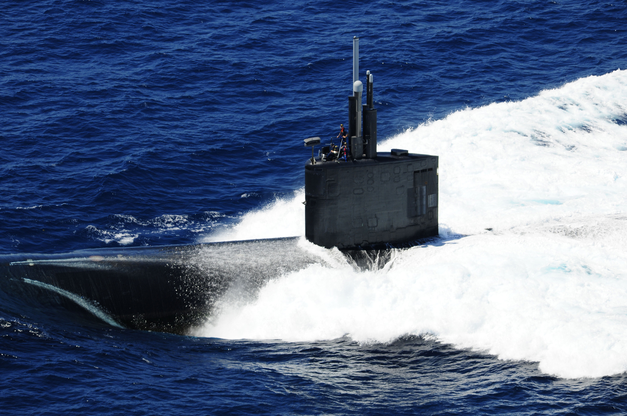 Atlantic Ocean. The fast-attack submarine USS Alexandria (SSN 757) surfaces for a formation sailing event while participating in the War of 1812 fleet exercise.