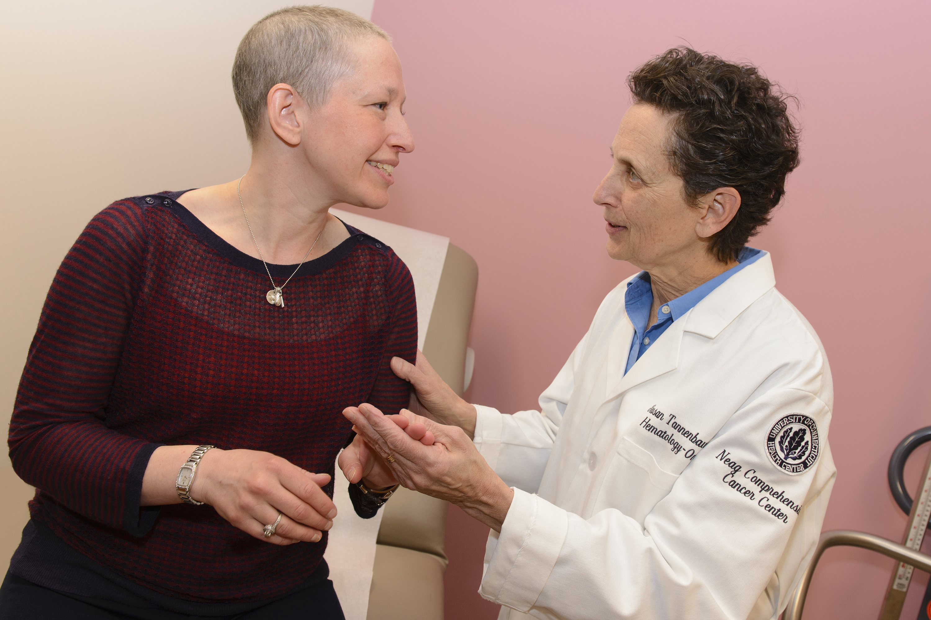 Cancer specialist Dr. Susan Tannenbaum with patient Elizabeth Johnston at UConn Health's Carole and Ray Neag Comprehensive Cancer Center. (Janine Gelineau/UConn Health Photo)