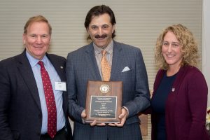 Angelo DeFazio receives Distinguished Alumnus Award.