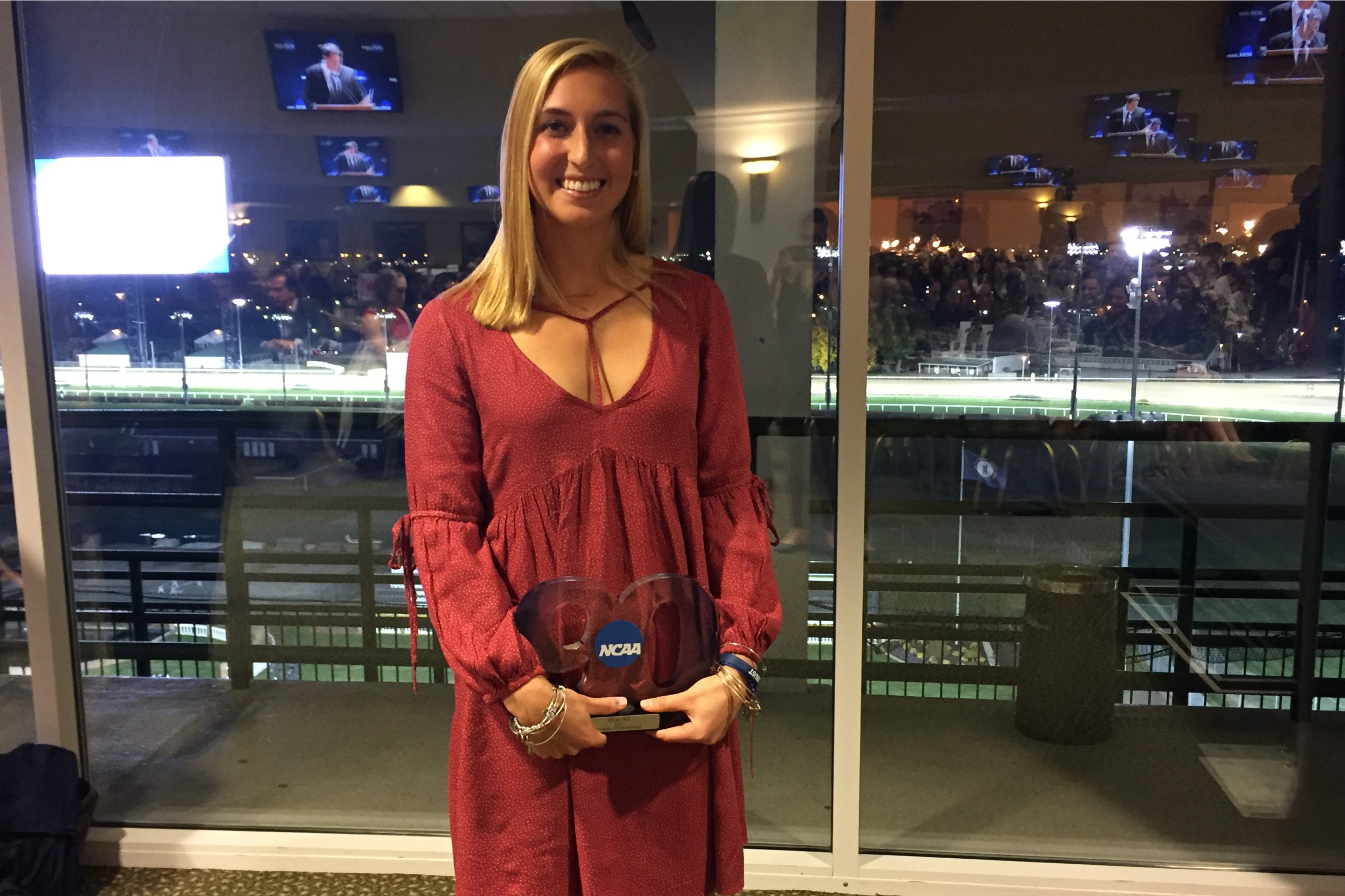 Ashley Rich poses with her NCAA Elite 90 award at the NCAA Field Hockey banquet on Nov. 23 in Louisville, Kentucky. (Alexandra Greene/UConn Photo)