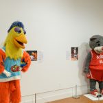 The Famous San Diego Chicken, left, and Clutch the Rockets Bear wearing a Chinese language jersey. (Peter Morenus/UConn Photo)