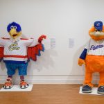 Winger the Eagle, left, the alumni mascot of the Washington Capitals, and Youppi! the mascot of the Montreal Expos and Montreal Canadiens. (Peter Morenus/UConn Photo)