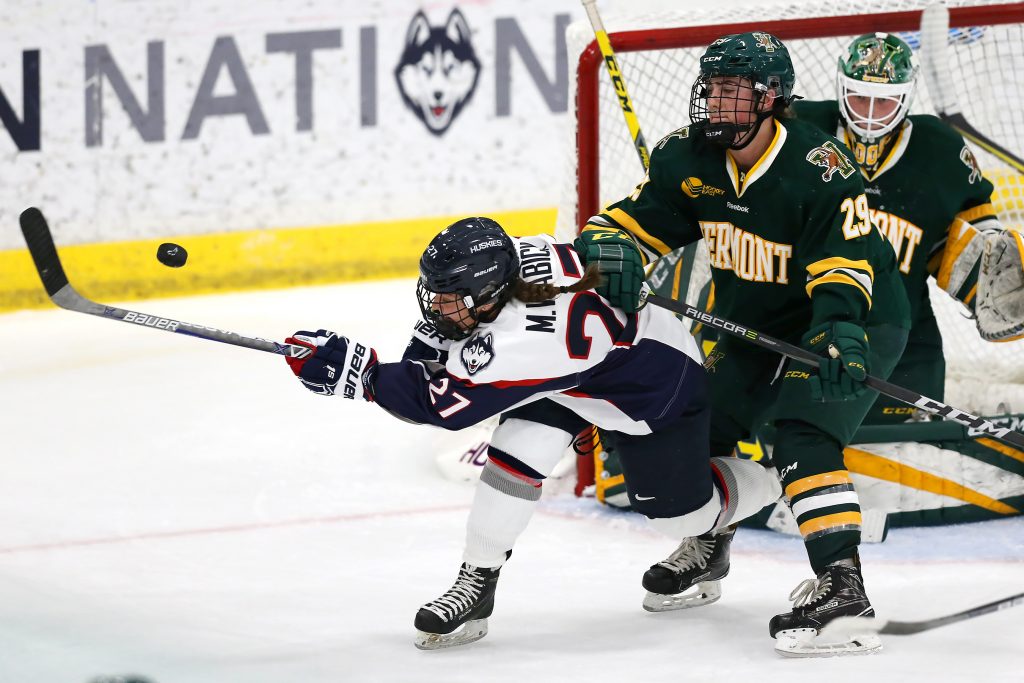 Morgan Wabick (27) on the offensive attack against Vermont at the Freitas Ice Forum on Oct. 7. (Stephen Slade '89 (SFA) for UConn)