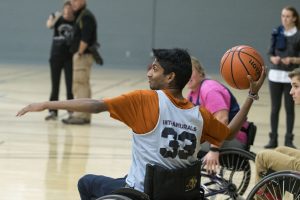 Sophomore Alex Abraham, a finance major, plays wheelchair basketball. (Garrett Spahn '18 (CLAS)/UConn Photo)