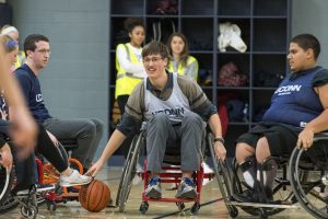 Eric Duwitt, a freshman majoring in civil engineering, plays wheelchair basketball. (Garrett Spahn '18 (CLAS)/UConn Photo)
