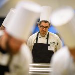 Andrew McMullen of McMahon dining looks over ingredients. (Peter Morenus/UConn Photo)