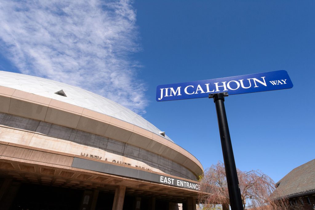 A view of Gampel Pavilion and the Jim Calhoun Way sign on April 29, 2015. (Peter Morenus/UConn Photo)