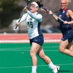 Laura Marcoux, at that time Laura Eichert, played on the Lacrosse team for four years while she was an undergraduate in Storrs. (Athletic Communications File Photo)