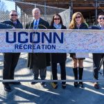 Jay Frain, left, director of UConn Recreation, Michael Gilbert, vice president for student affairs, Cynthia Costanzo ' 88 (ED), '90 MA, executive director of UConn Recreation, President Susan Herbst, and Rachel Conboy '16 (CLAS), a former USG president at the topping off ceremony for the new Student Recreation Center. (Peter Morenus/UConn Photo)
