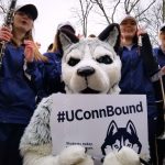 Accepting our incoming class is not something we at UConn take lightly. On Feb. 23, Jonathan the Husky delivered an admission letter to a student, feted by members of the UConn Marching Band and accompanied by Jonathan XIV. (Bret Eckhardt/UConn Photo)