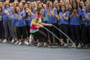 Princess Madison jumping rope while students cheer her on at HuskyTHON, a dance marathon to raise money for Connecticut Children’s Medical Center on  Feb. 17, 2018. (Sean Flynn/UConn Photo)