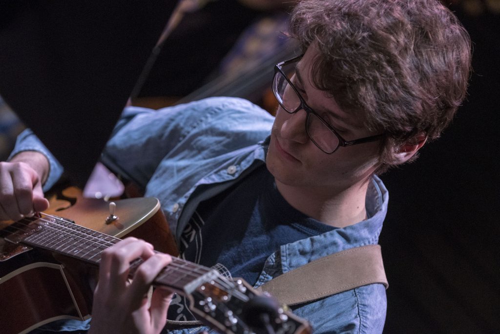 Thomas Bora, a sophomore music major, plays the guitar at “Jazz Night at the Ballard,”on Feb. 20, 2018. (Garrett Spahn '18 (CLAS)/UConn Photo)