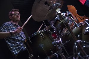 Steven McArdle, a senior music major, plays the drums at “Jazz Night at the Ballard” on Feb. 20. (Garrett Spahn '18 (CLAS)/UConn Photo)