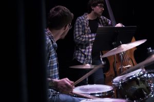 Music majors Steven McArdle (drums) and Nathan Giordano (bass) play at “Jazz Night at the Ballard” on Feb. 20. (Garrett Spahn '18 (CLAS)/UConn Photo)