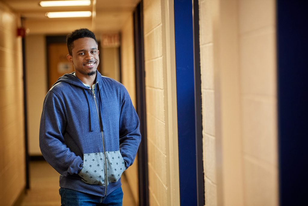 Norwyn Campbell '20 (ENG) in a hallway at Eddy Residence Hall on March 22, 2018. (Peter Morenus/UConn Photo)