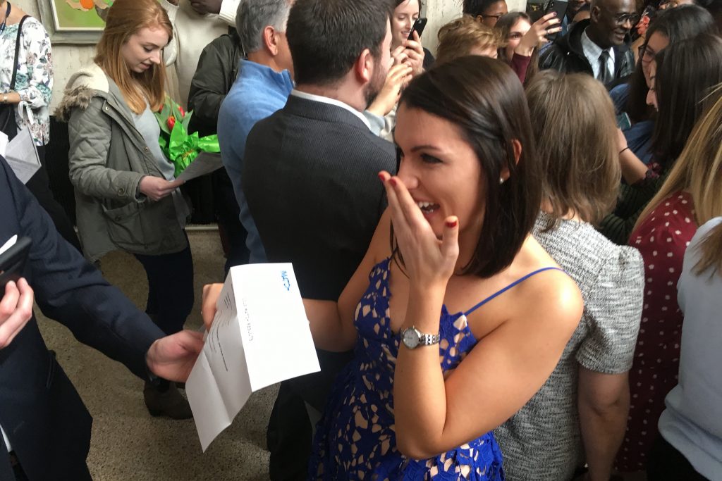 UConn medical student Fludiona Naka is overjoyed with the news of her match. She will do her residency training in dermatology at Yale-New Haven Hospital and then NewYork-Presbyterian Hospital-Columbia University Medical Center. (Lauren Woods/UConn Health Photo)