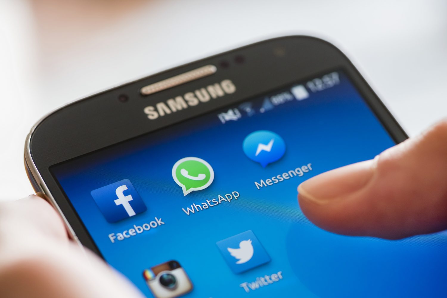 Icon of Facebook, WhatsApp, and Messenger (Facebook's proprietary messaging app) alongside other social media apps on a Samsung Galaxy smartphone's touchscreen. (Erik Tham/Getty Images)